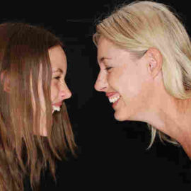 daughter and mother laughing